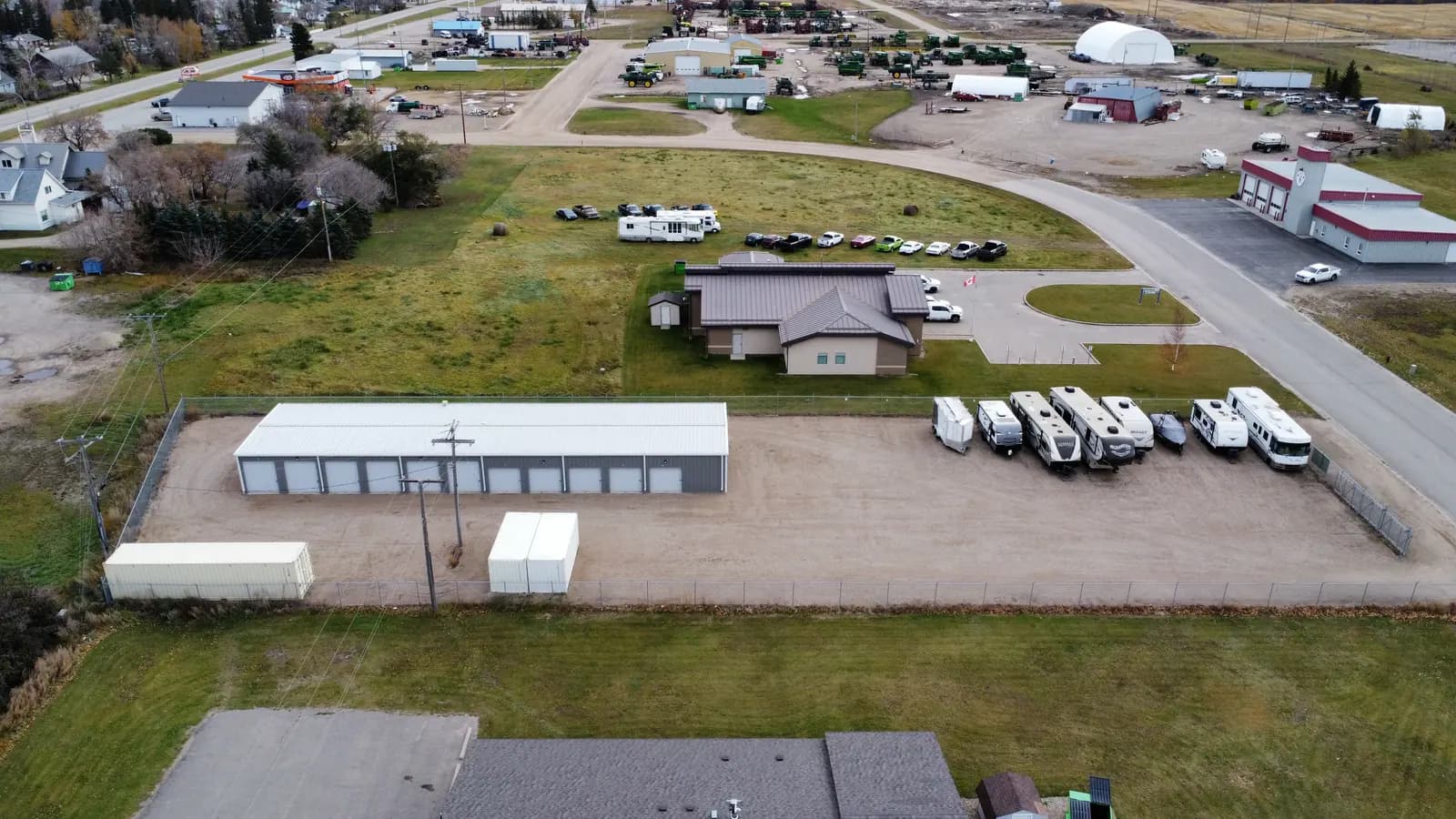 RVs parked beside the storage building
